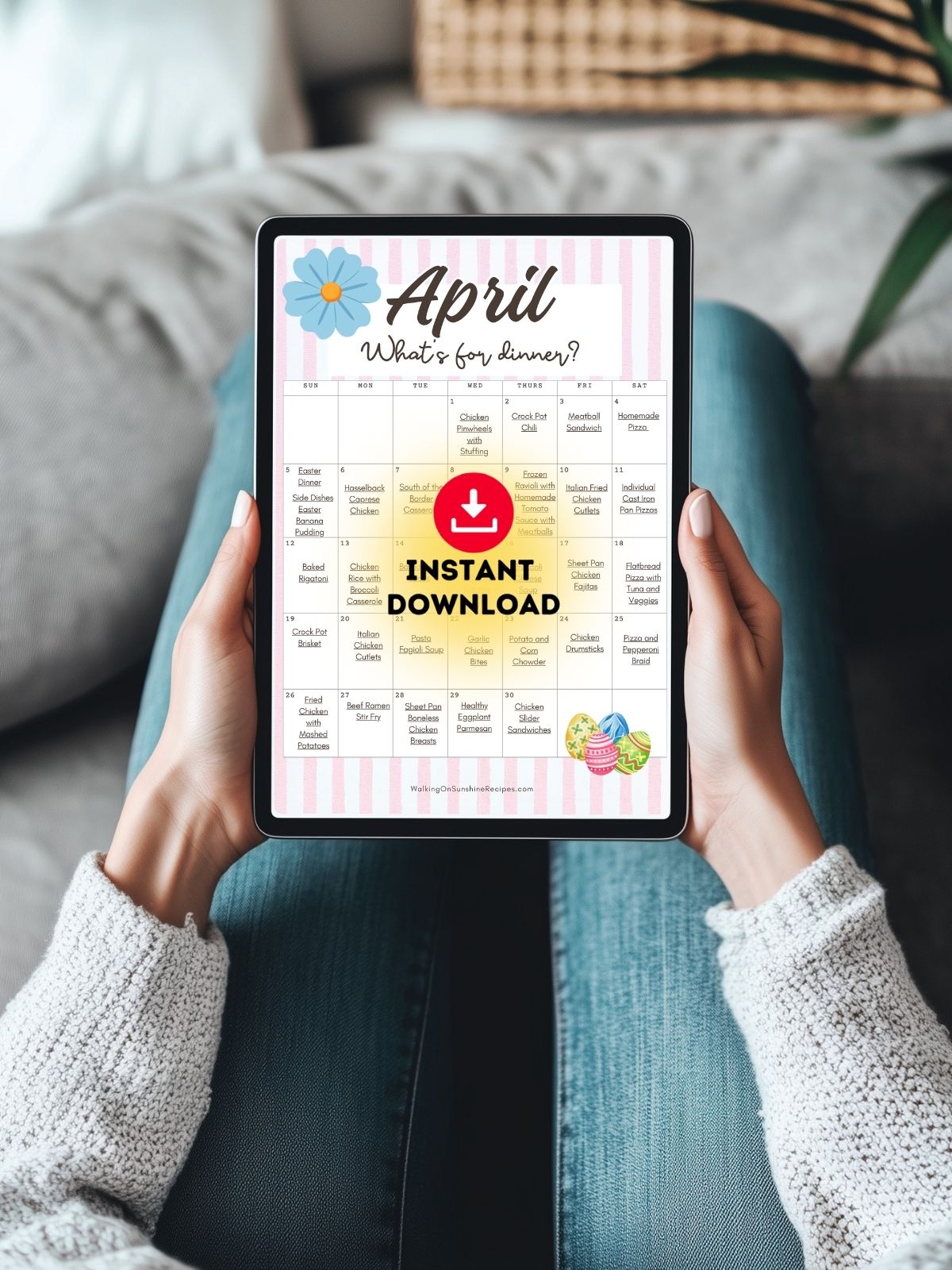 person holding tablet with a copy of the april meal monthly calendar displayed.